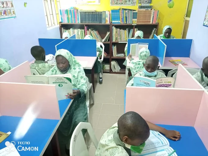 Pupils reading in the school library